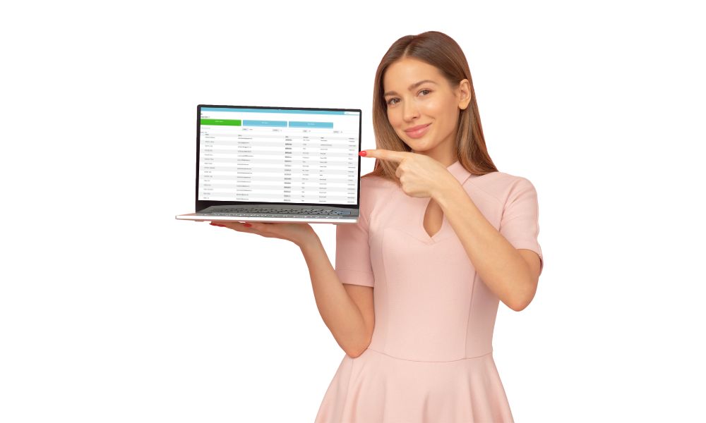 woman holding a laptop with time tracking software on it and smiling